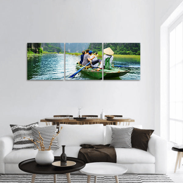 Tourists traveling in boat in Ngo Dong River ,Vietnam panoramic canvas wall art