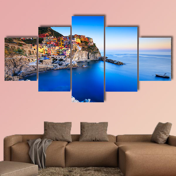 Manarola village on cliff rocks and sea at sunset multi panel canvas wall art