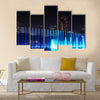 Illuminated fountain at night in modern city Kuala Lumpur  multi panel canvas wall art