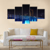 Illuminated fountain at night in modern city Kuala Lumpur  multi panel canvas wall art