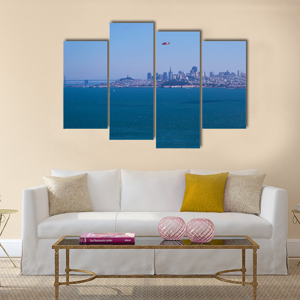 A helicopter flying over the Bay area in SanFrancisco with blue sky on a sunny day In California, USA, Multi Panel Canvas Wall Art