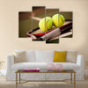 A shot of a tennis racquet and tennis balls Multi panel canvas wall art