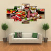 Appetizers on a wooden cutting board Multi panel canvas wall art