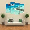 The Seaplane Flying Over The Maldives Oslands, Raaato, Multi Panel Canvas Wall Art