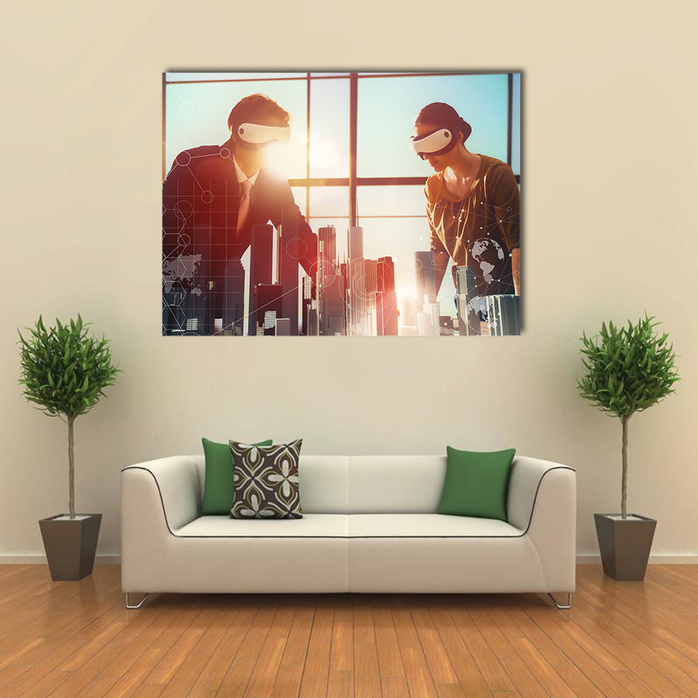 Two business persons are developing a project using virtual reality goggles Multi panel canvas wall art