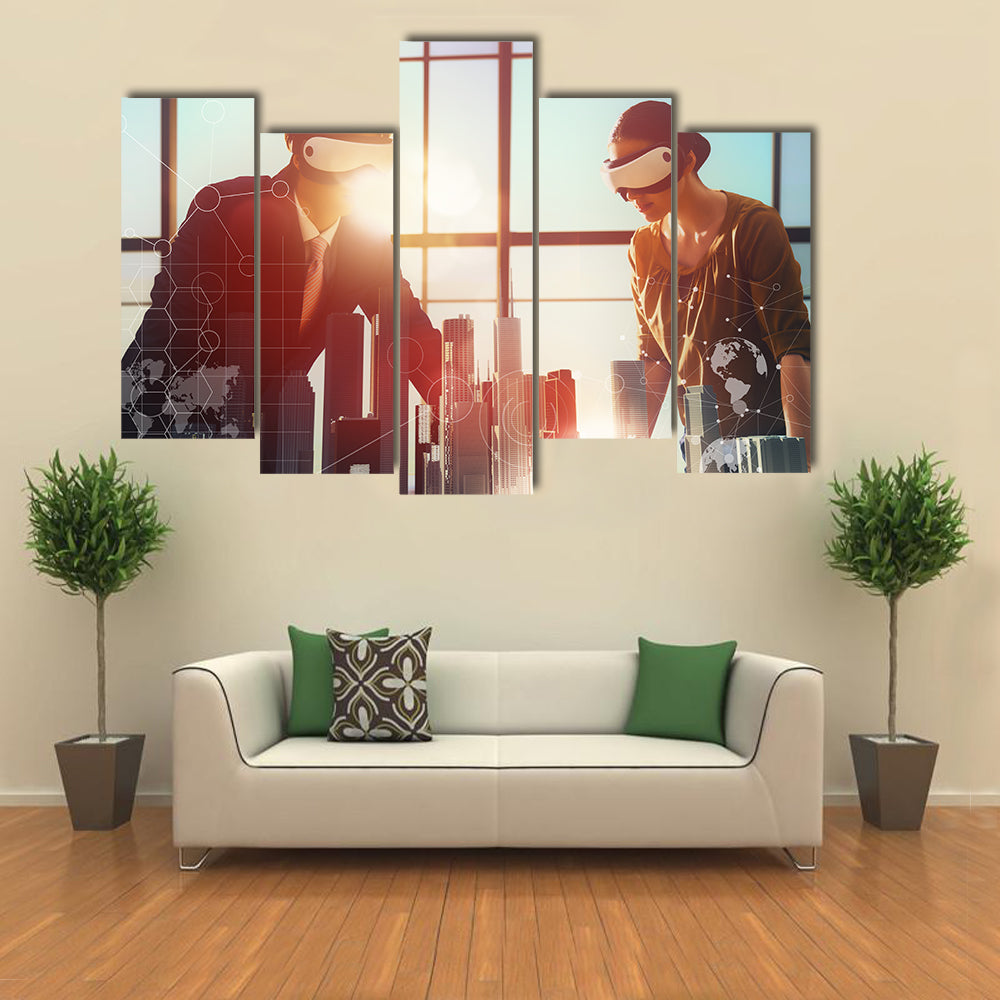 Two business persons are developing a project using virtual reality goggles Multi panel canvas wall art