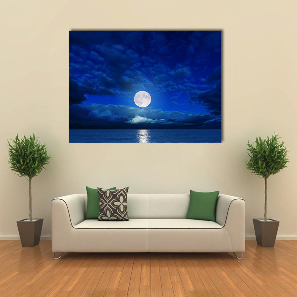 low moon in clouds over river multi panel canvas wall art