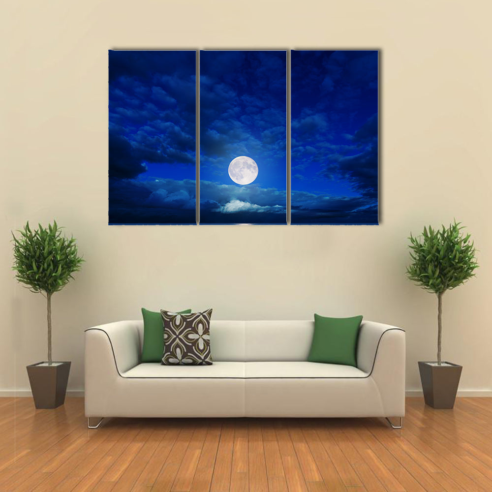 low moon in clouds over river multi panel canvas wall art