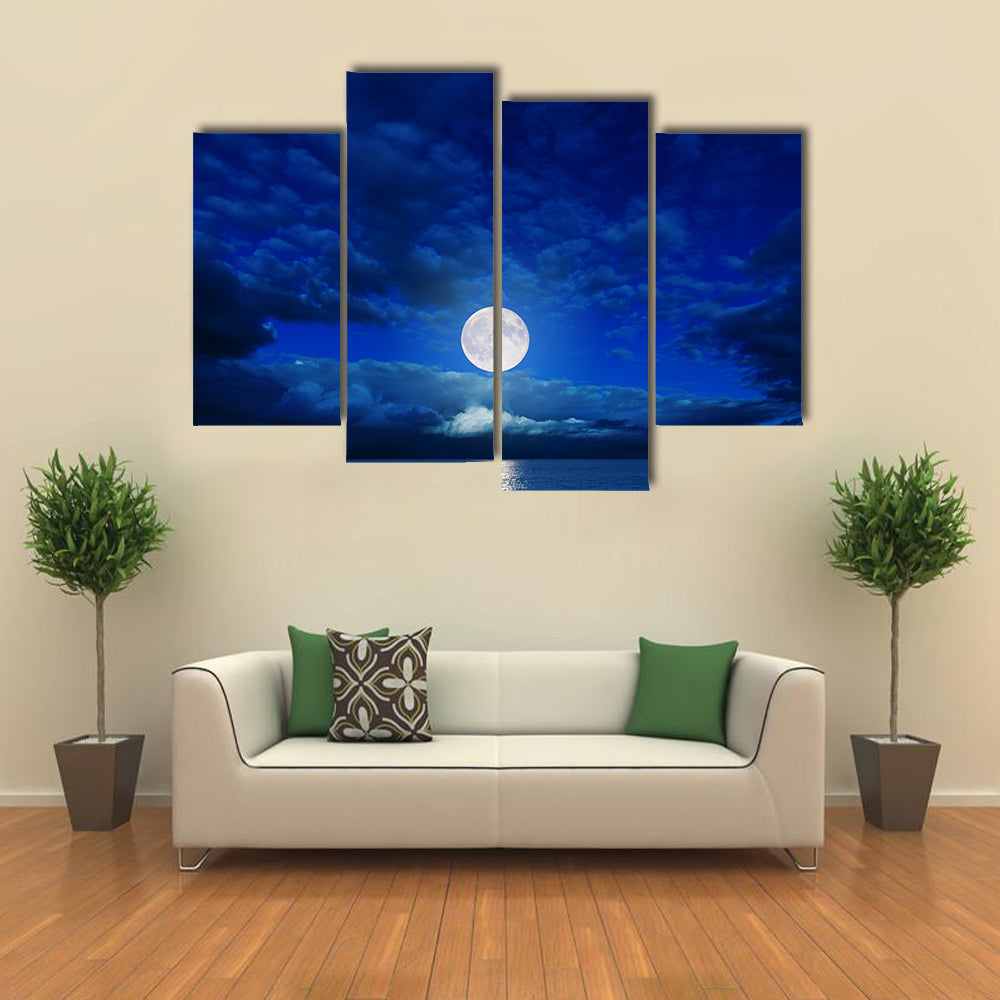 low moon in clouds over river multi panel canvas wall art