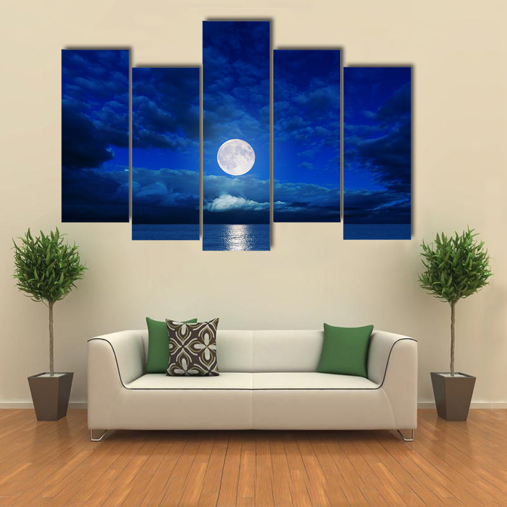 low moon in clouds over river multi panel canvas wall art