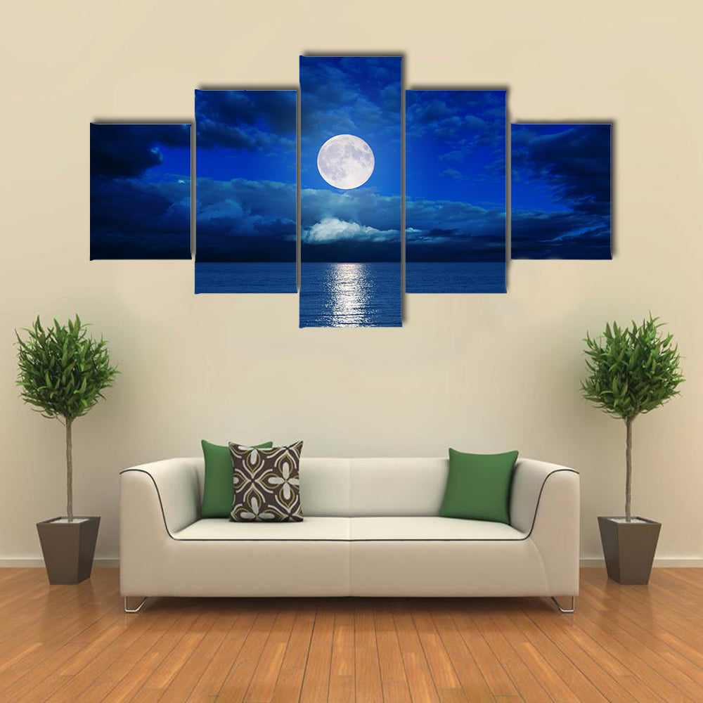 low moon in clouds over river multi panel canvas wall art