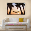 hammock and palm trees on the beach Multi Panel Canvas Wall Art