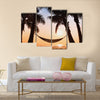 hammock and palm trees on the beach Multi Panel Canvas Wall Art