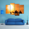 Silhouettes of camels at sunset multi panel canvas wall art