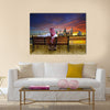 A man looking at the cityscape of Kuwait Multi Panel Canvas Wall Art