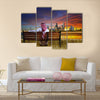 A man looking at the cityscape of Kuwait Multi Panel Canvas Wall Art