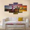 A man looking at the cityscape of Kuwait Multi Panel Canvas Wall Art