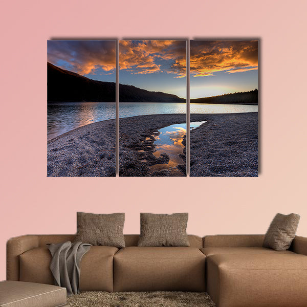 Orange clouds at sunset over Pend Oreille Lake Multi panel canvas wall art.