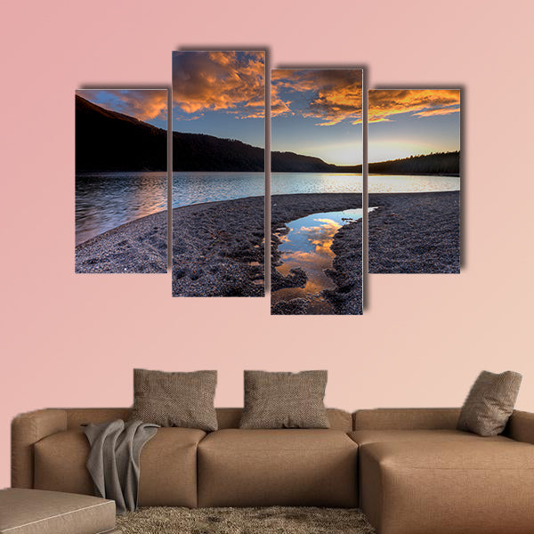 Orange clouds at sunset over Pend Oreille Lake Multi panel canvas wall art.