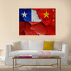 Flags of Chile and China painted on cracked wall Multi panel canvas wall art