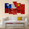 Flags of Chile and China painted on cracked wall Multi panel canvas wall art