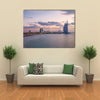 View of the illuminated Burj Al Arab and Jumeirah Beach Hotel at the sunset Multi panel canvas wall art