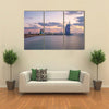 View of the illuminated Burj Al Arab and Jumeirah Beach Hotel at the sunset Multi panel canvas wall art