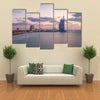 View of the illuminated Burj Al Arab and Jumeirah Beach Hotel at the sunset Multi panel canvas wall art