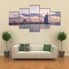 View of the illuminated Burj Al Arab and Jumeirah Beach Hotel at the sunset Multi panel canvas wall art