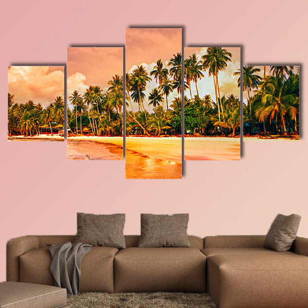 Beautiful tropical beach with palm trees at sunset Multi panel canvas wall art