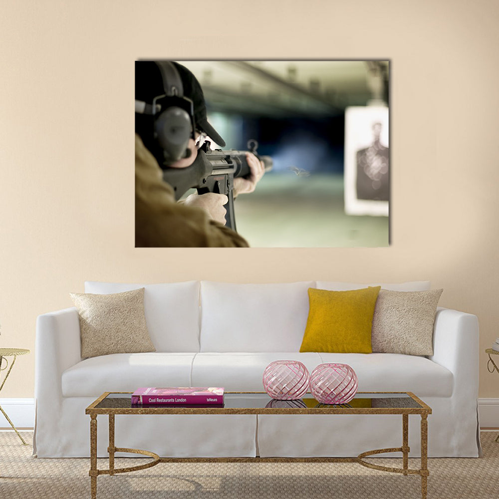Man shooting machine gun at a target multi panel canvas wall art