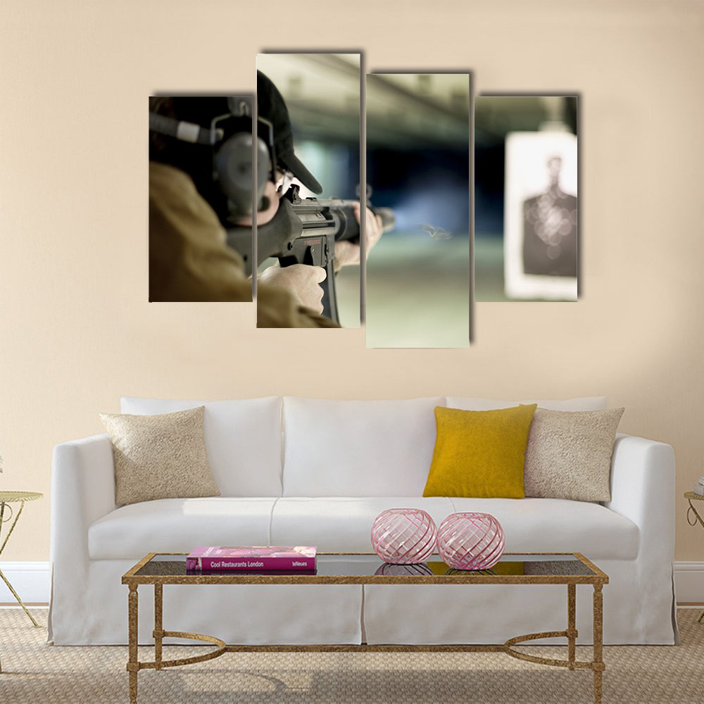 Man shooting machine gun at a target multi panel canvas wall art