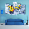 robotic arms in a car plant multi panel canvas wall art