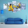 robotic arms in a car plant multi panel canvas wall art