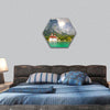 Alpine glacier lake with St Bartholoma church hexagonal canvas wall art