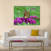 Beautiful orange monarch butterfly on butterfly bush Multi Panel Canvas Wall Art