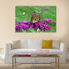 Beautiful orange monarch butterfly on butterfly bush Multi Panel Canvas Wall Art