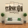 herd of elephants walking in Africa multi panel canvas wall art