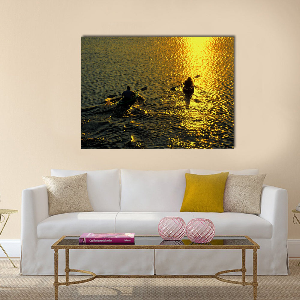 Silhouette of Man and Woman Kayaking at Sunset Multi panel canvas wall art