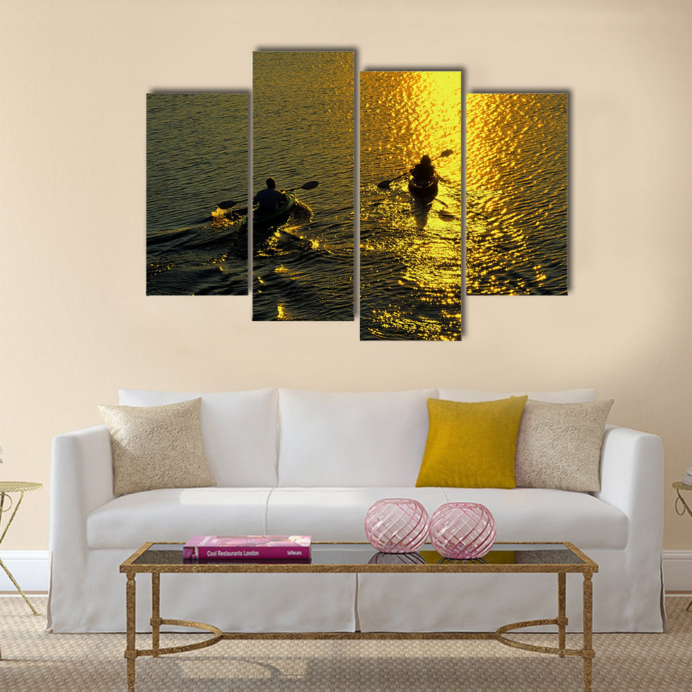 Silhouette of Man and Woman Kayaking at Sunset Multi panel canvas wall art