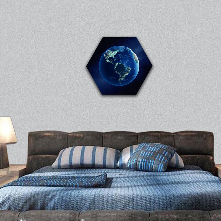 Earth with city lights at night in outer space hexagonal canvas wall art