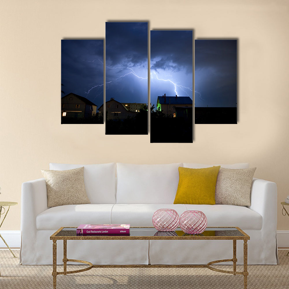 Lightning in the cloudy storm sky over village Multi Panel Canvas Wall Art