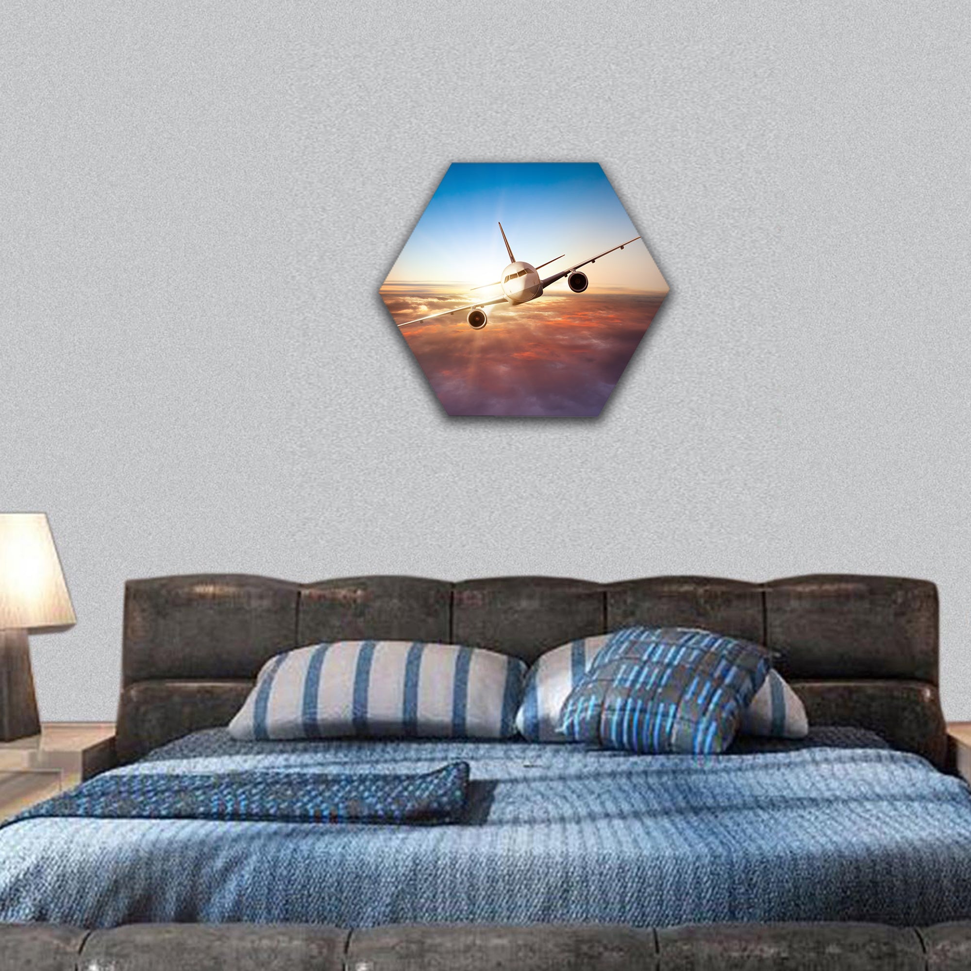 airplane flying above clouds in dramatic sunset light hexagonal canvas wall art