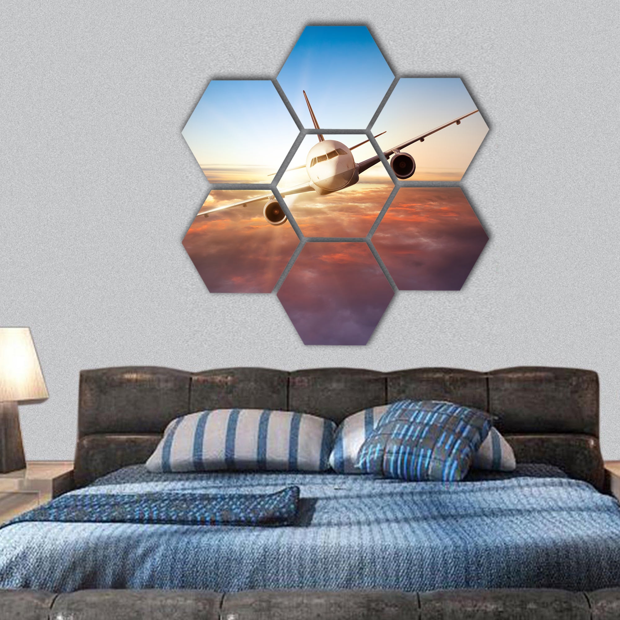 airplane flying above clouds in dramatic sunset light hexagonal canvas wall art