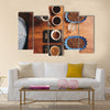 Overhead shot of a professional barista pouring hot water from a stainless steel kettle Multi Panel Canvas Wall Art