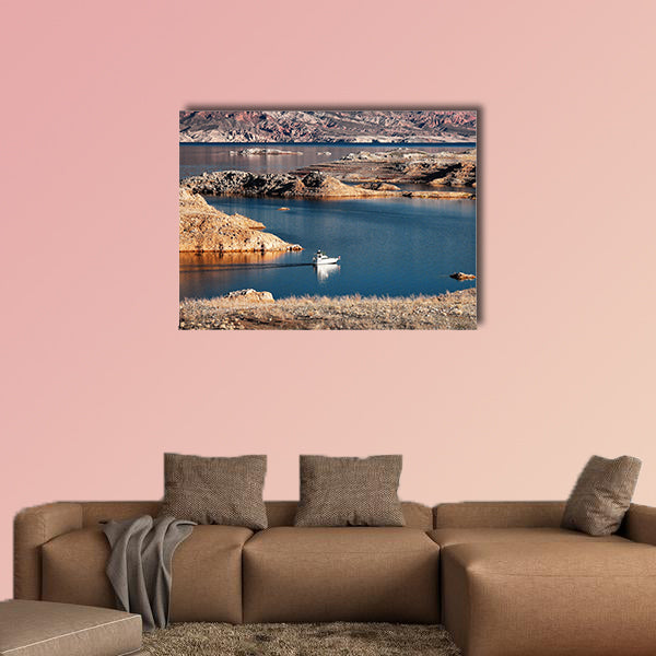A white motorboat cruising through a channel in Lake Mead multi panel canvas wall art
