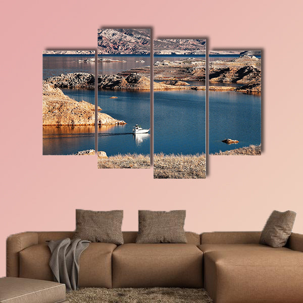 A white motorboat cruising through a channel in Lake Mead multi panel canvas wall art