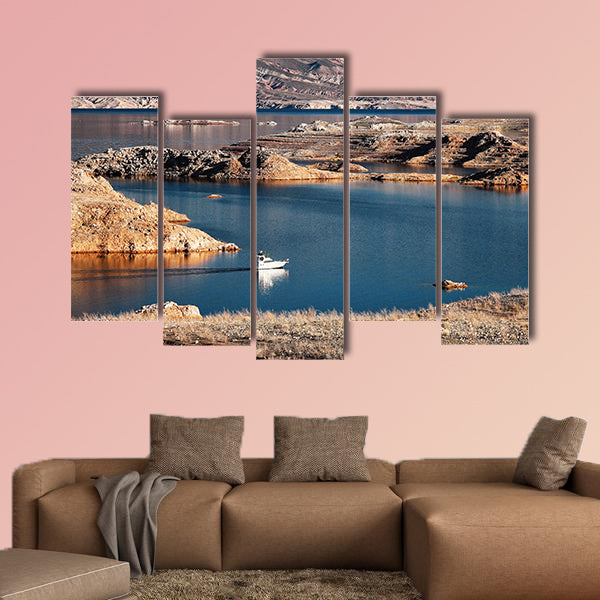 A white motorboat cruising through a channel in Lake Mead multi panel canvas wall art
