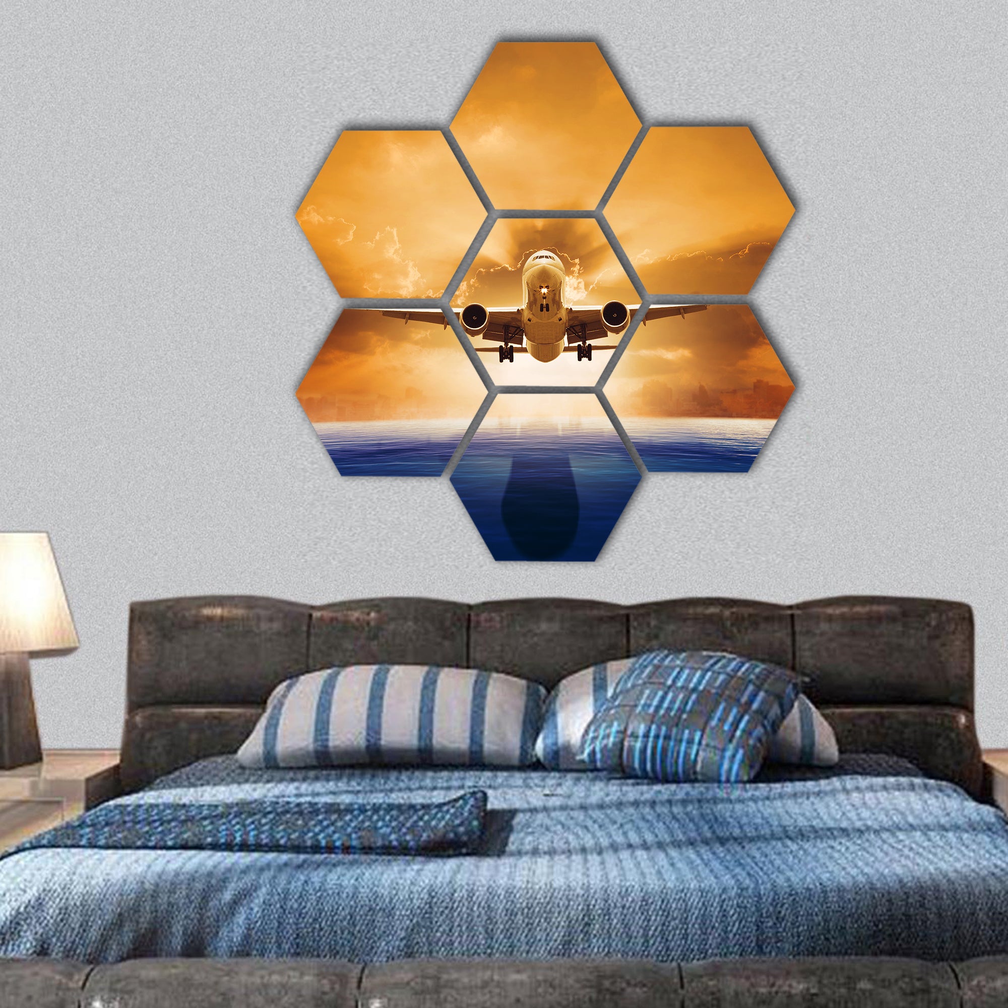 Passenger jet plane flying over beautiful sea hexagonal canvas wall art