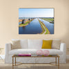 Traditional windmills at Kinderdijk in the Netherlands Multi panel canvas wall art